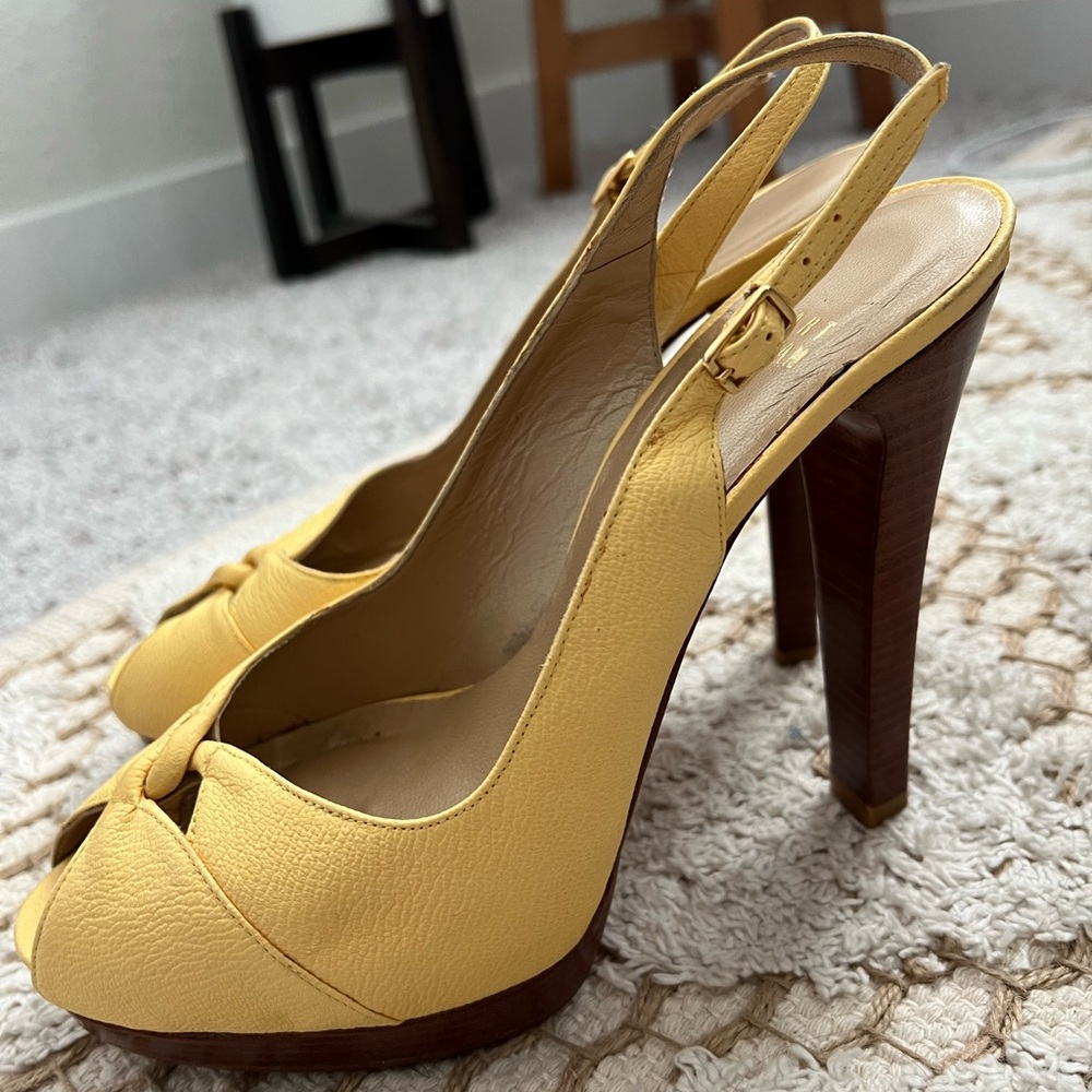 Yellow Stuart Weitzman heels. Size 8.